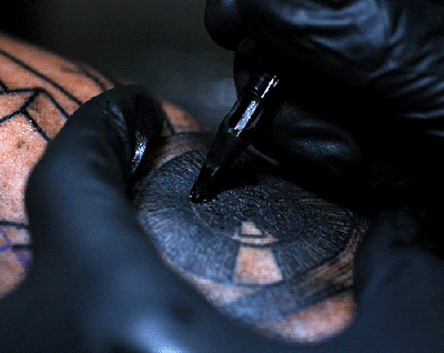 Slow-motion tattoo needle