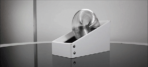 Never ending slinky machine