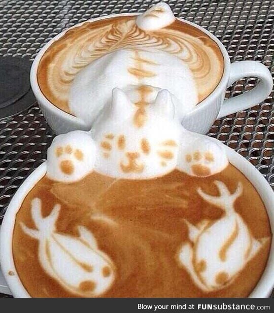 Coffee art in two mugs