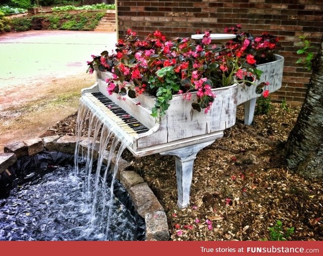 Old piano turned into fountain