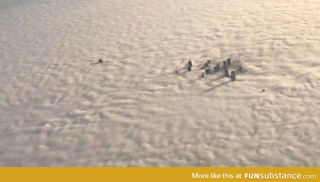 The skyscrapers in Dallas look like rocks being washed over by a wave