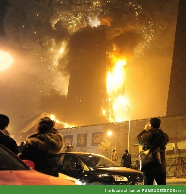 A skyscraper in Beijing went up in a blaze after some folks lit fireworks in it