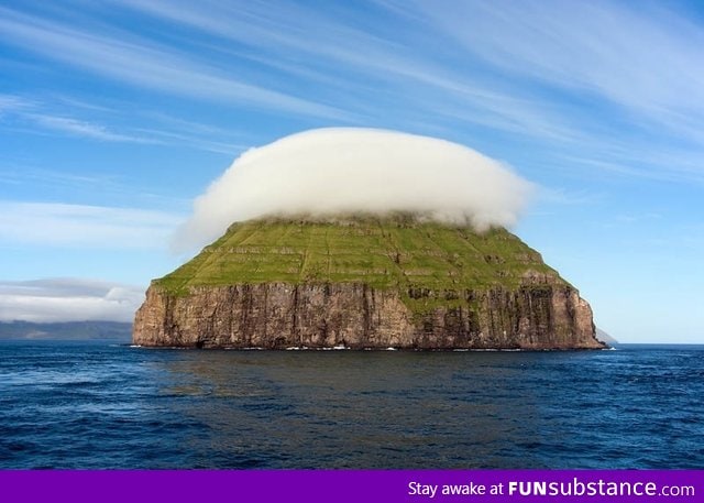 The cloud covered island of Litla Dimun