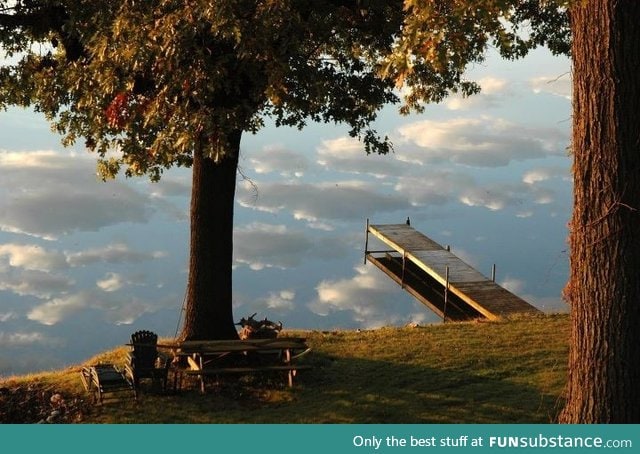 Reflective pond creates an illusion