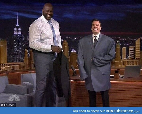 Jimmy Fallon wearing Shaq's jacket