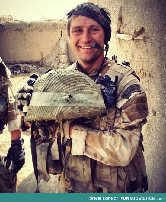 Guy survives round to the head thanks to Kevlar helmet