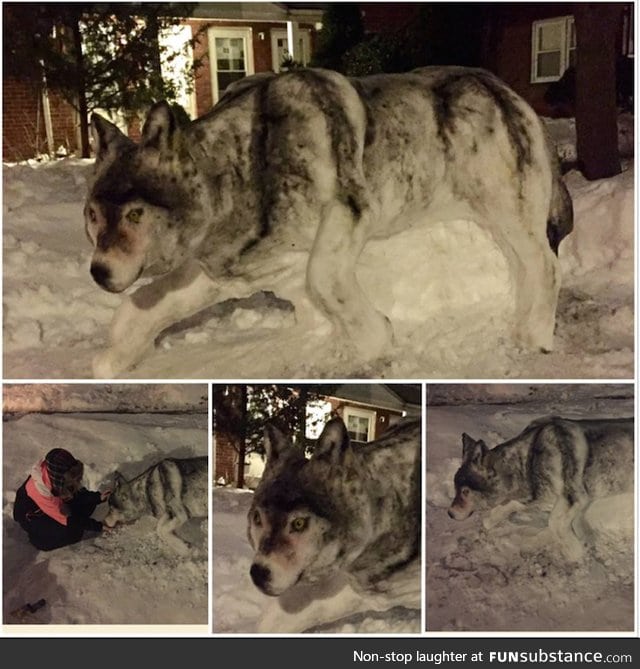 Incredible wolf snow sculpture