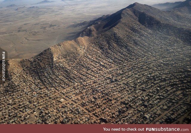 Slums crest the hill line in Kabul, Afghanistan