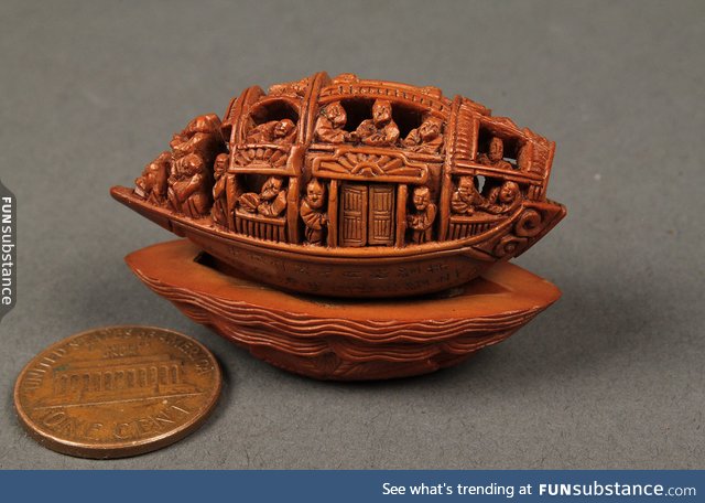Carved peach pit from 1900