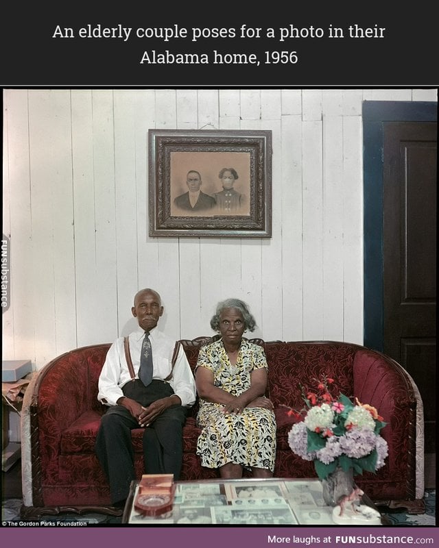 An elderly couple poses for a photo in their Alabama home, 1956