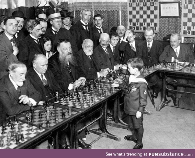 Samuel Reshevsky, age 8, defeating several chess masters at once in France, 1920