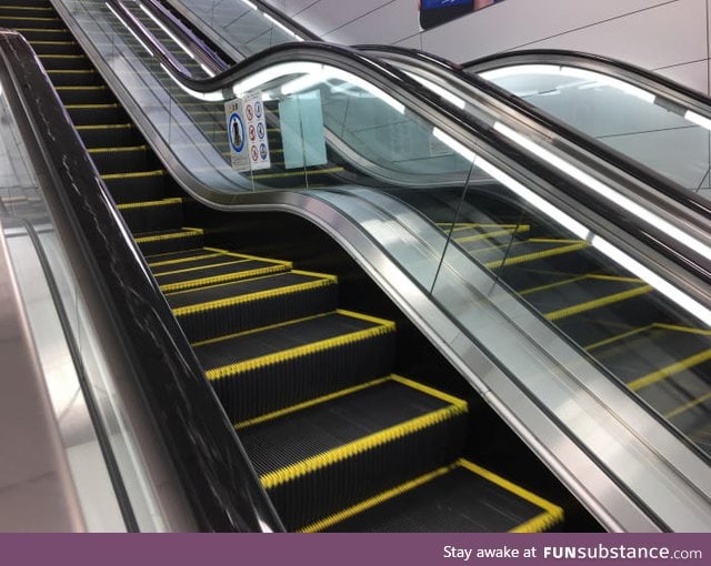 This escalator has a flat section in the middle