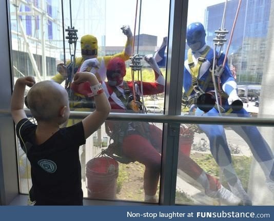 Power Ranger window washers surprise children at hospital