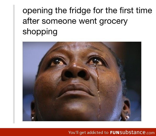 Opening fridge after shopping