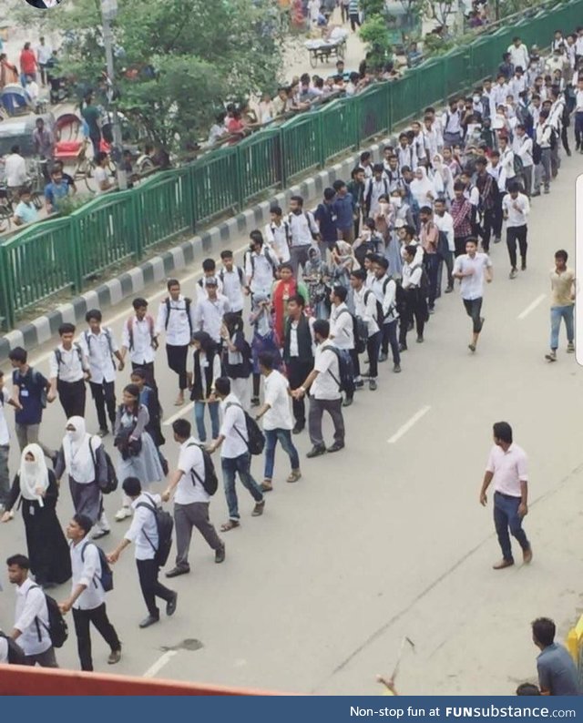 Male students protecting female students in Bangladesh