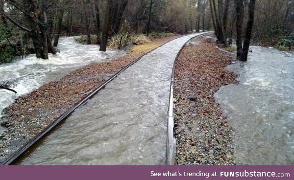 The train tracks won't let the water escape