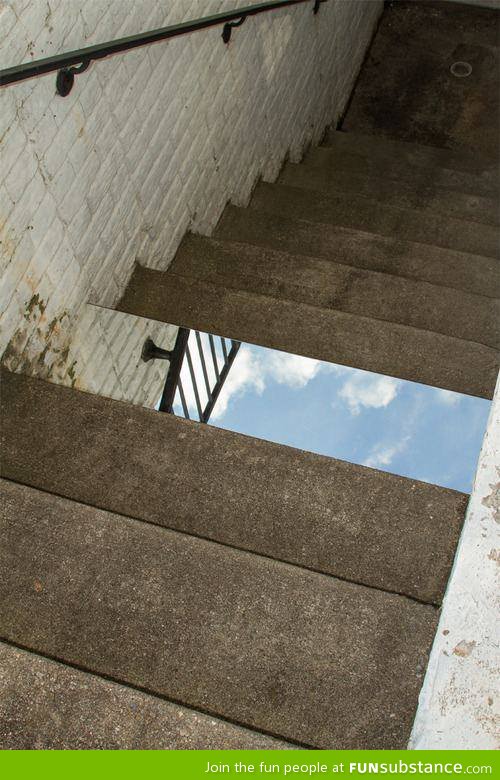 Put a mirror on the stairs, scare the crap out of everyone