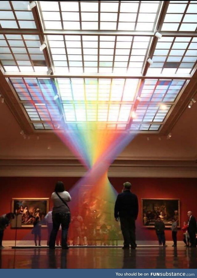 Artist uses 60 miles of thread to create a rainbow