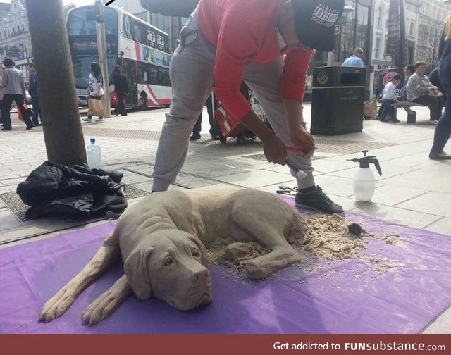 This dog made out of sand