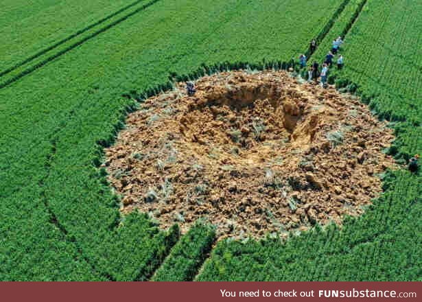 Crater from a 250 kilo WW2 bomb which detonated last weekend in a farmer's field in