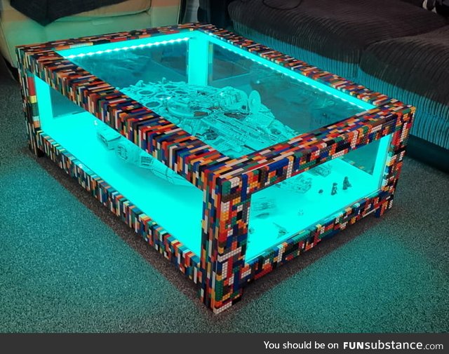 This guy made a coffee table for his Lego millennium falcon