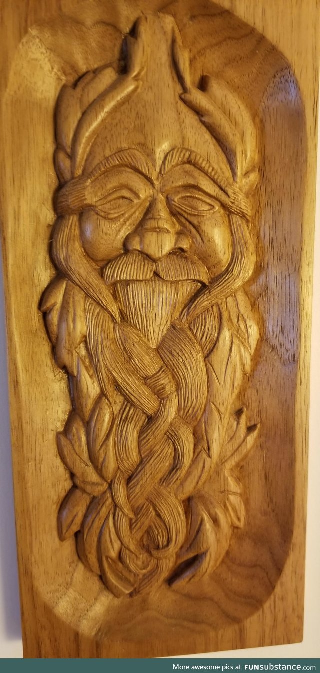 A wooden picture my grandfather carved by hand