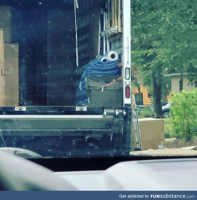 This stack of towels and rolls looks like cookie monster