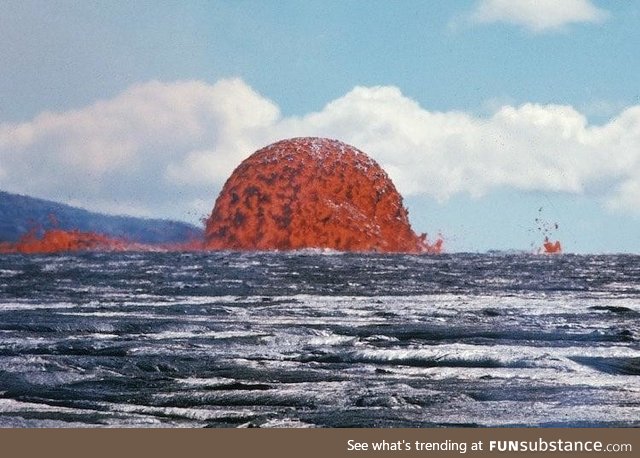 This photo captures a rare sight of a 65-foot-tall Lava Dome in Hawaii. Symmetrical dome