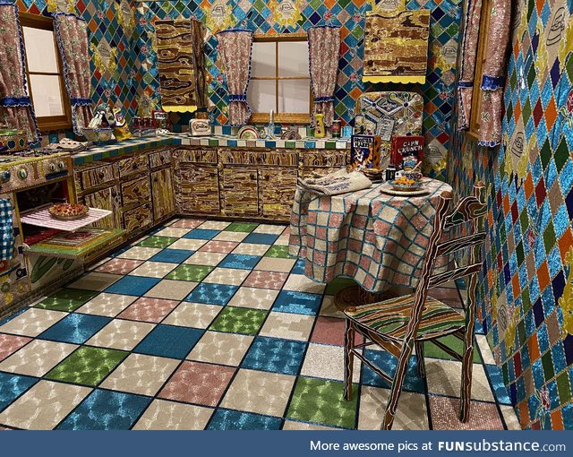 Life-size kitchen (real appliances etc.) covered in glass seed beads – artist is Liza