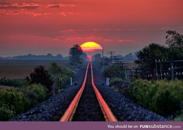 The sun rises just right and reflects along the railroad tracks. Photo by Raymond