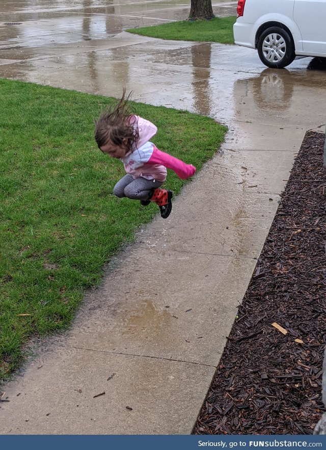 Sometimes little girls just need to jump in puddles