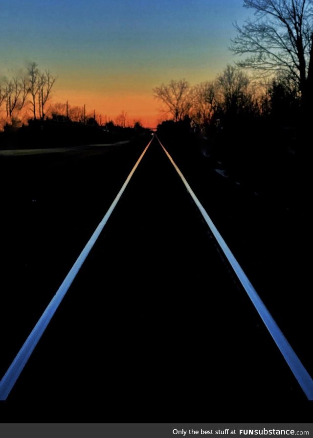 Train tracks at night