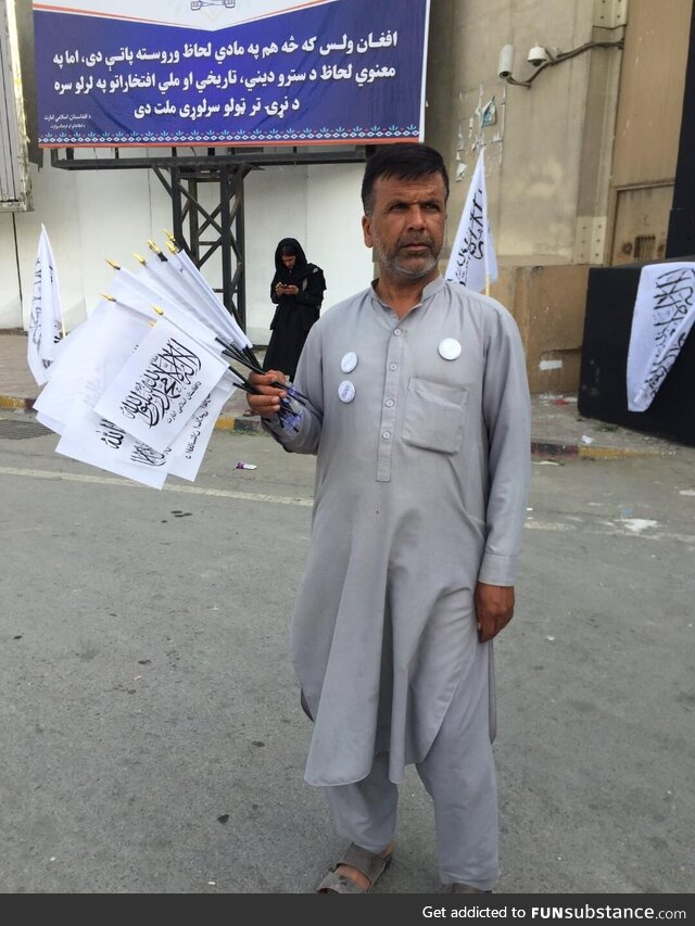 Former Policeman, now selling Taliban Flags on Street