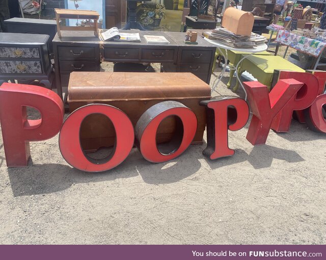 The first thing I noticed at the Brimfield antique show today was this sign. Keep on