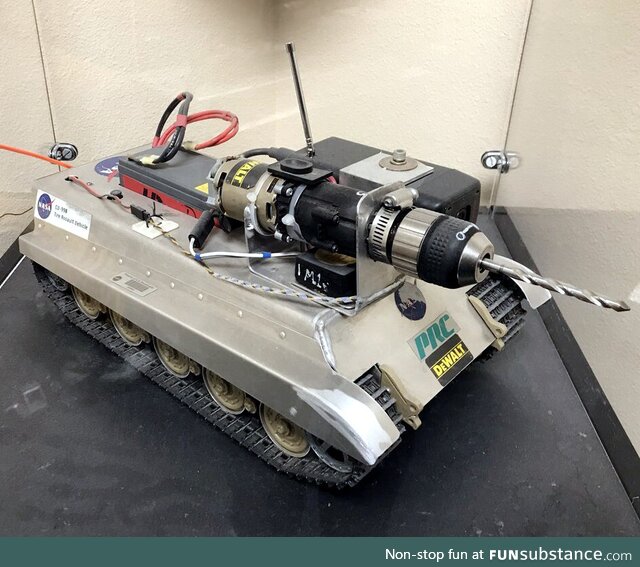 Drill robot used to deflate potentially damaged tires after a space shuttle lands. Tires