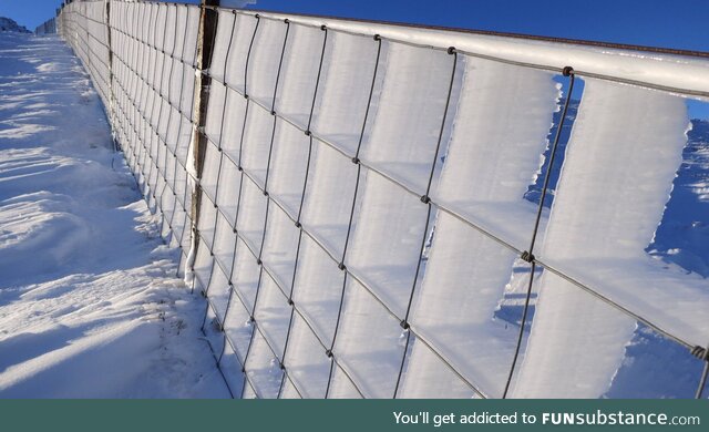 Ice driven through a fence