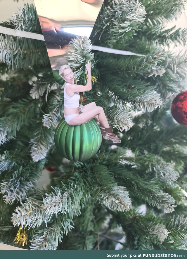 It's not Xmas until Miley is on the tree