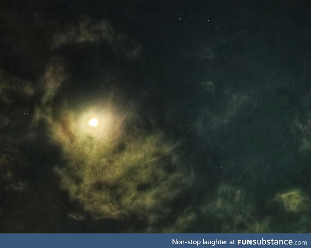 Clouds and moon make it look like it is all in space