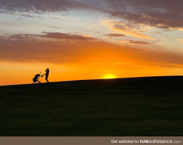 A picture of my friend golfing