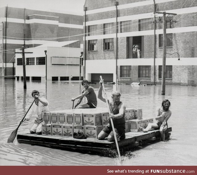 Brisbane flood January 24 1974 with some people rescuing beer from a brewery