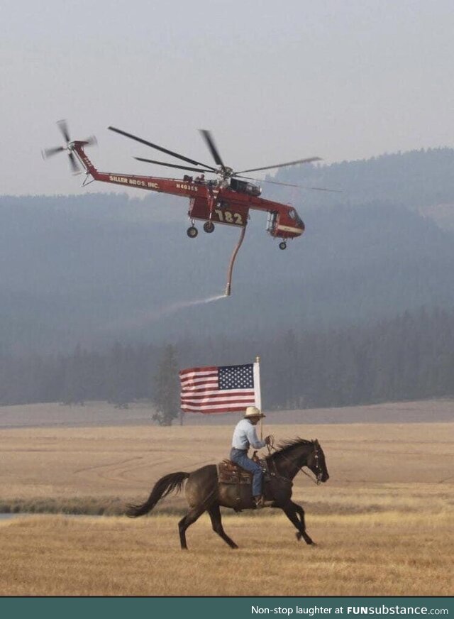 Rancher shows his thanks to helicopter firefighting crew pilling water off his property