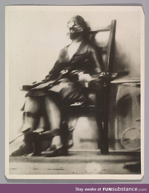 The first picture of the electric chair being used on a person. Her name was Ruth Snyder