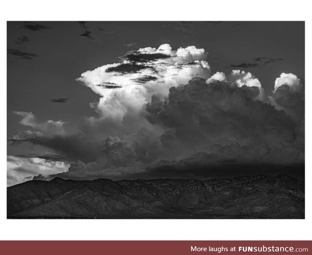 Monsoon storm clouds building over the Mule Mountains in Cochise County, Arizona in 2022