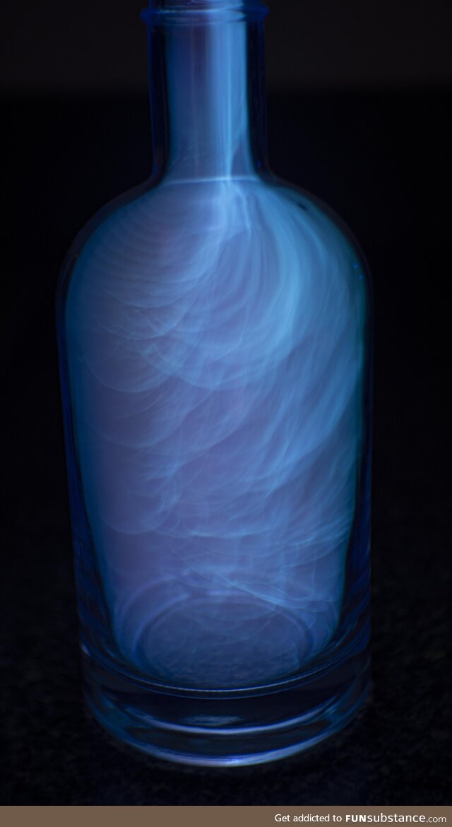 4 second exposure of alcohol vapor burning in a bottle