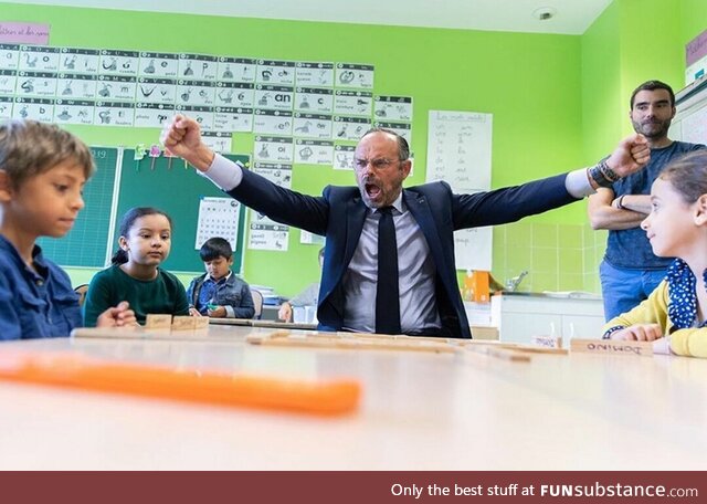 The French Prime minister winning a game of dominoes