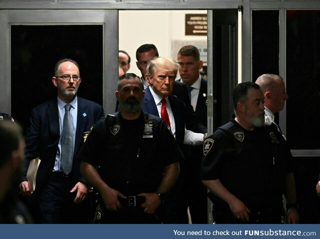 Donald Trump on his way to the courtroom