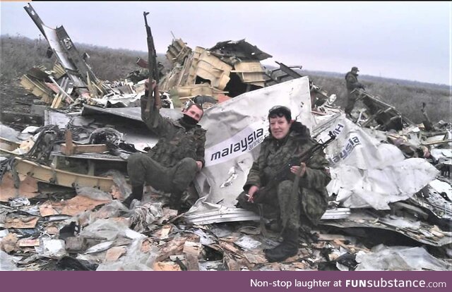 Russian soldiers are photographed near the downed Boeing MH17. It happened exactly 10