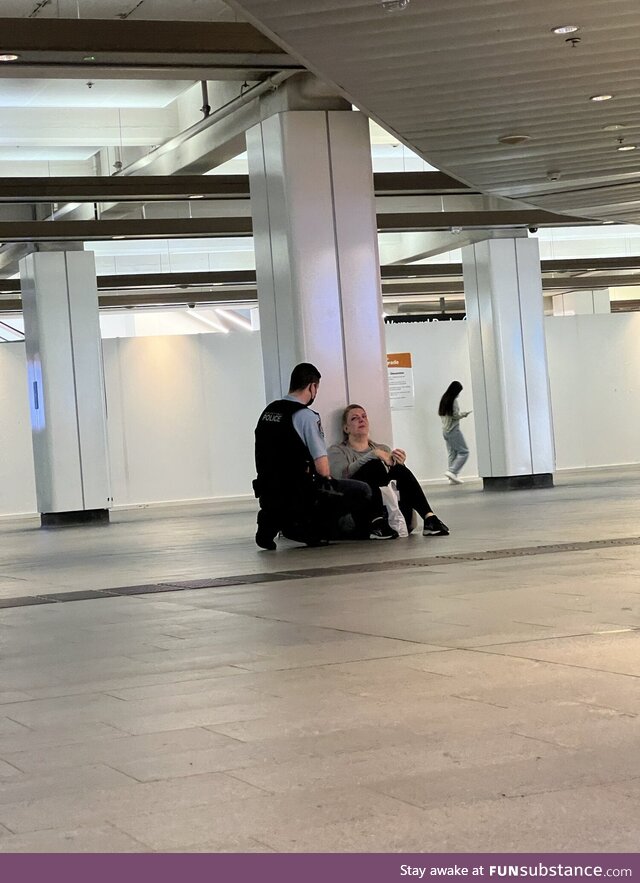 Aussie cop comforts crying woman