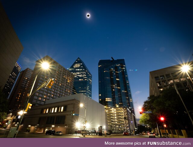 Black sun over Dallas