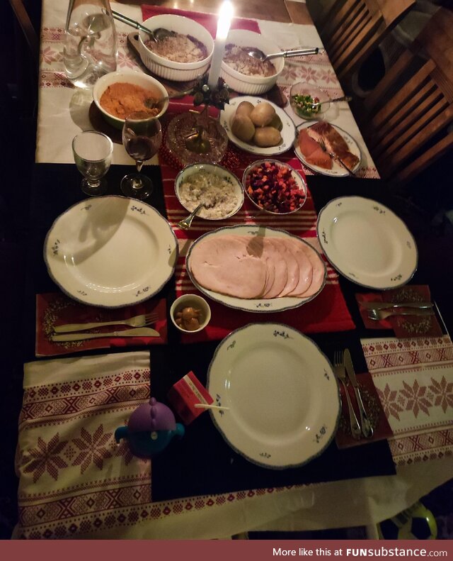 Our first Christmas in our house that we bought last month. Tablecloth is actually a